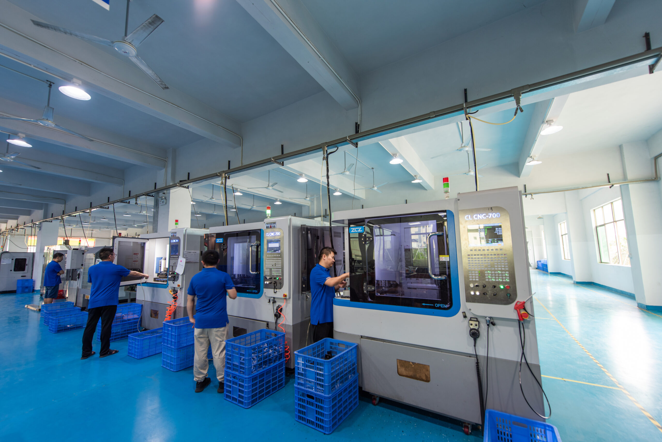 D Marjan manufacturing team working with eyewear materials